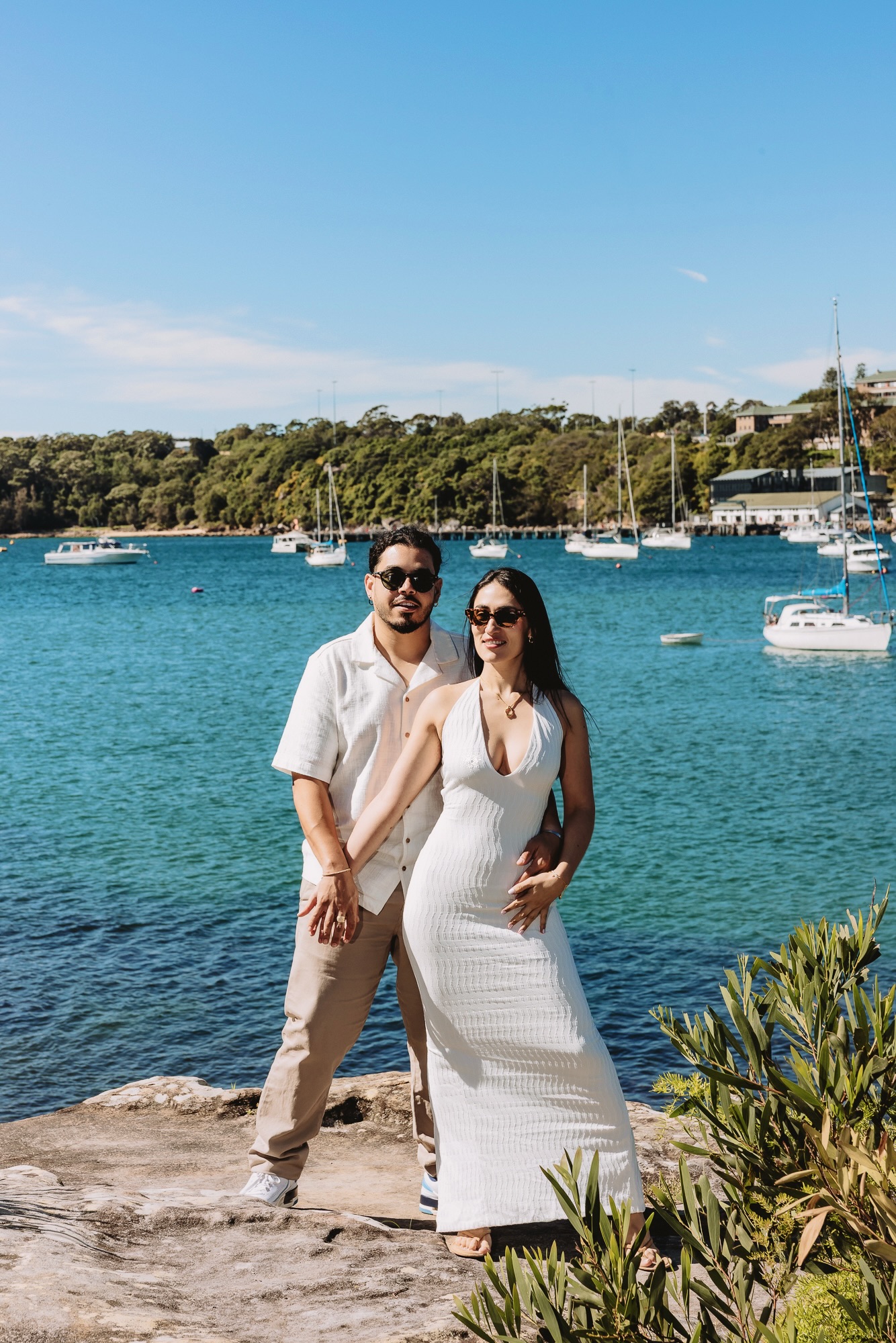 Angela and Harold in front of sailing boats